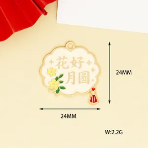 Detail showing the exact dimensions of the Mid-Autumn Festival enamel flower and moon charm