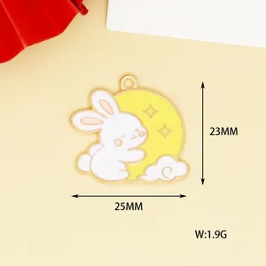 Close-up view of a cute rabbit and moon enamel charm with dimensions of 25x23mm