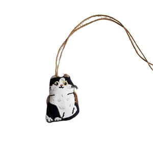 Sweet and cute handmade black and white fabric cat pendant necklace with brown leather cord