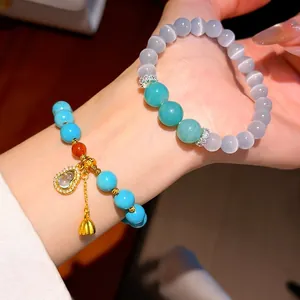 Bracciale in perline di turchese placcato oro 24k con ciondolo a zucca in zirconi