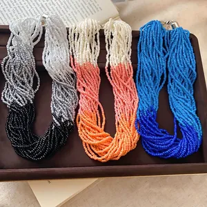 Handmade multi-strand seed bead necklace in vibrant gradient colors for daily wear