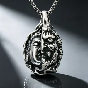 Detailed view of stainless steel dual-face pendant with Gothic Buddha and demon design
