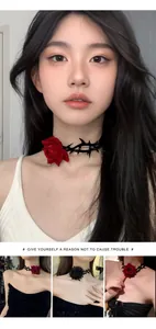 Detailed view of Gothic Halloween choker with red rose and thorny vine design
