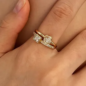 Elegant 3-piece gold stainless steel stacking ring set with zircon floral charms for women