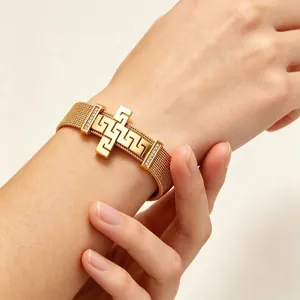 Gold mesh bracelet for women with Greek key pattern cross and rhinestones