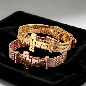 Adjustable stainless steel mesh bracelet with Greek key cross and sparkling rhinestones