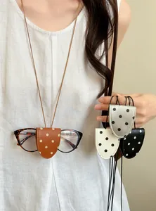 Stylish polka dot leather magnetic glasses clip necklace for convenient sunglasses storage
