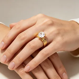 Elegant four-prong zircon ring with gold stainless steel double-groove band for women