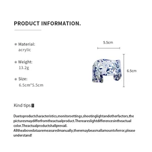 Detail view of floral cutout acrylic open bangle with product dimensions and specs