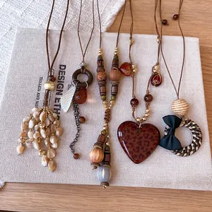 Vintage Bohemian Leopard Heart Tassel Pendant Necklace Luxury Alloy Acrylic Wood Bead Sweater Chain Jewelry For Women Gift