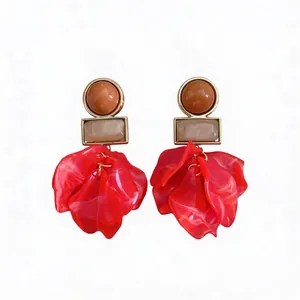 Statement red acrylic petal drop earrings with geometric stone-like bead accents