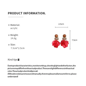 Product detail page showing red acrylic petal drop earrings with size specifications
