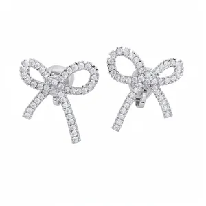 Élégantes boucles d'oreilles clips nœud en argent serties de zircons ronds brillants