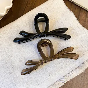 Juego de 2 elegantes pinzas para el cabello con lazo en color gelatina para peinar.