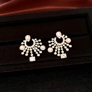 Luxury gold zircon sunburst earrings with sparkling crystals for elegant evening wear