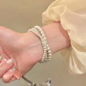 Elegante dubbele parelarmband met zirkonia sluiting detail voor dames