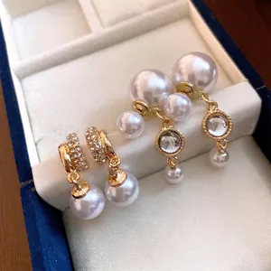 Elegant and versatile S925 silver needle pearl tassel earrings displayed in a jewelry box.