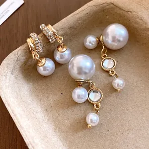 Elegant pearl tassel earrings and gold hoop studs for versatile fashion