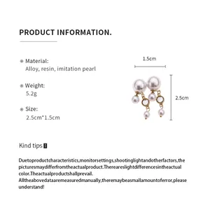 Product dimension details and material information for pearl tassel stud earrings.