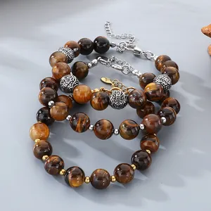 Macro close-up detail of retro tiger eye stone bracelets with stainless steel clasp