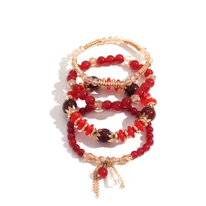 Juego de cuatro pulseras de cuentas de estilo étnico vintage con cuentas rojas de acrílico