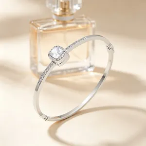 Elegant silver titanium steel bangle with square zircon pavé setting for women