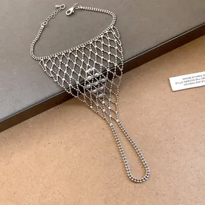 Detailed view of silver hollow mesh ring bracelet hand chain luxury fashion style