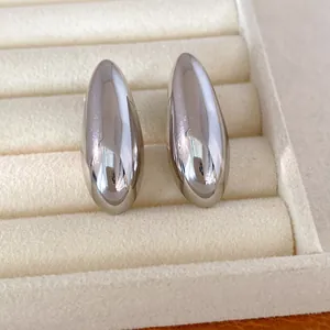 Elegant minimalist silver-tone oval stud earrings with a high-gloss mirror finish