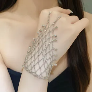 Elegant silver-toned hollow mesh hand harness bracelet with delicate beaded fringe detail