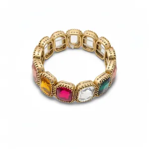 Vintage style elastic bracelet featuring multi-colored rectangular crystals in gold-tone metal