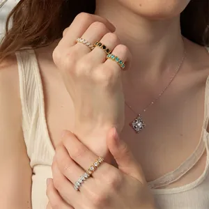Close-up of luxury 18K gold plated stainless steel rings with colorful stones