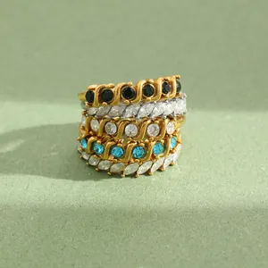 Stack of 18K gold plated stainless steel rings with colorful marquise and round crystals