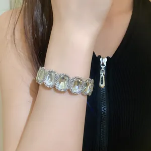 Close-up of vintage elastic bracelet with sparkling rectangular crystals on wrist