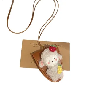 Collar con colgante de cordero de peluche con cordón de cuero marrón y accesorios