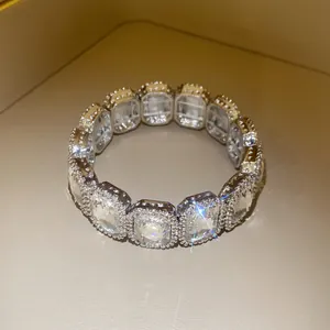 Detail view of vintage style elastic bracelet with large rectangular crystals and pavé settings