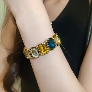 Close-up of vintage style elastic bracelet with colorful rectangular rhinestones