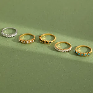 Exquisite 18K gold plated stainless steel rings featuring marquise and round cut zircons.