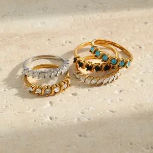 Close-up detail of 18K gold plated stainless steel rings with colorful marquise stones