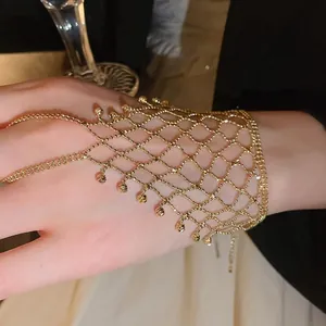 Elegant gold mesh tassel ring bracelet harness featuring bohemian fringe beads design