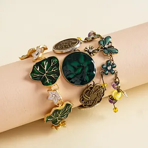Vintage detailed view of enamel leaf and flower bracelet with sparkling rhinestones