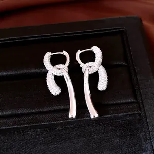 Elegant 18k gold plated dangle earrings with sparkling zircon double drop design.