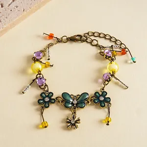 Vintage bronze flower butterfly bracelet with colorful resin beads and rhinestones