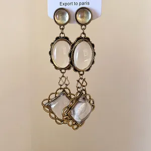 Boucles d'oreilles vintage en bronze avec pendentifs ovales et en losange
