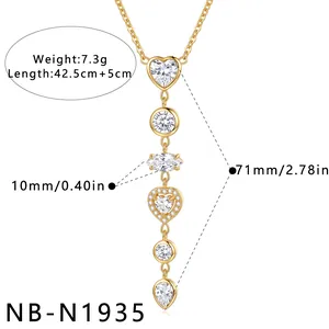 Detailed size view of gold stainless steel heart necklace with cubic zirconia settings.