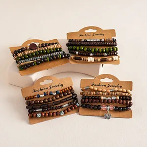Vintage ethnic style wooden beaded bracelet sets with butterfly charm on display cards.