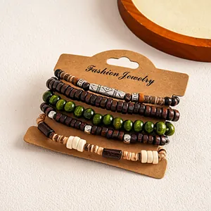 Close-up of 5-piece set vintage ethnic wooden beaded elastic bracelets on display card
