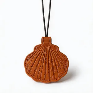 Minimalist leather shell-shaped pendant necklace and glasses clip with black cord
