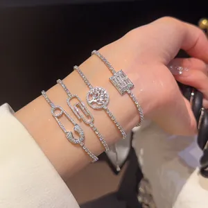 Elegante conjunto de pulseras para mujer con motivos de clip y árbol y circonitas brillantes