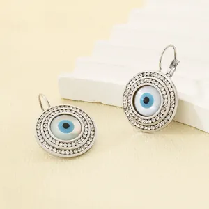 Élégantes boucles d'oreilles œil protecteur en acier inoxydable et strass brillants