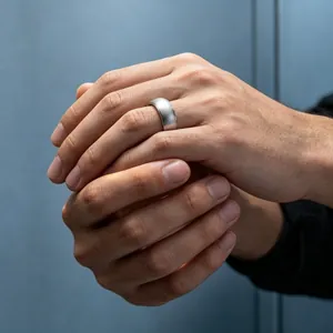 Minimalist brushed stainless steel domed ring with a matte finish for men and women